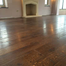 Generations hand plained rich tutor finish flooring with the lacquer dried.